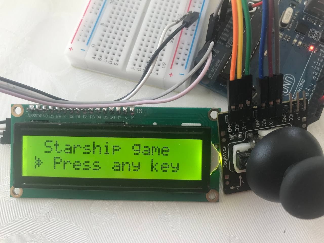 /how-to-build-an-arduino-starship-game-controlled-by-joystick-and-computer feature image